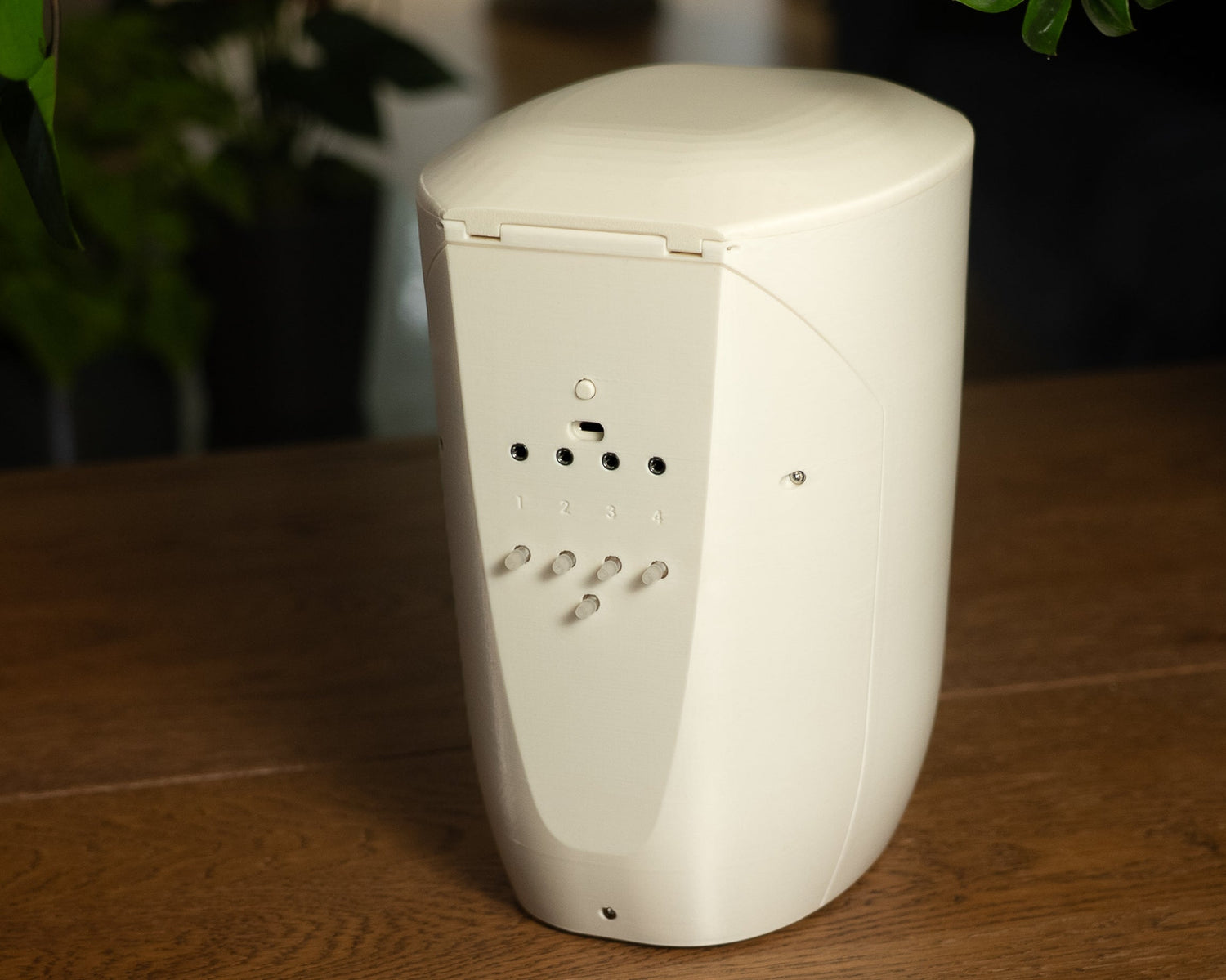 PlantMate automatic plant watering system with 4 sensor ports providing plant care peace of mind during travel and vacations