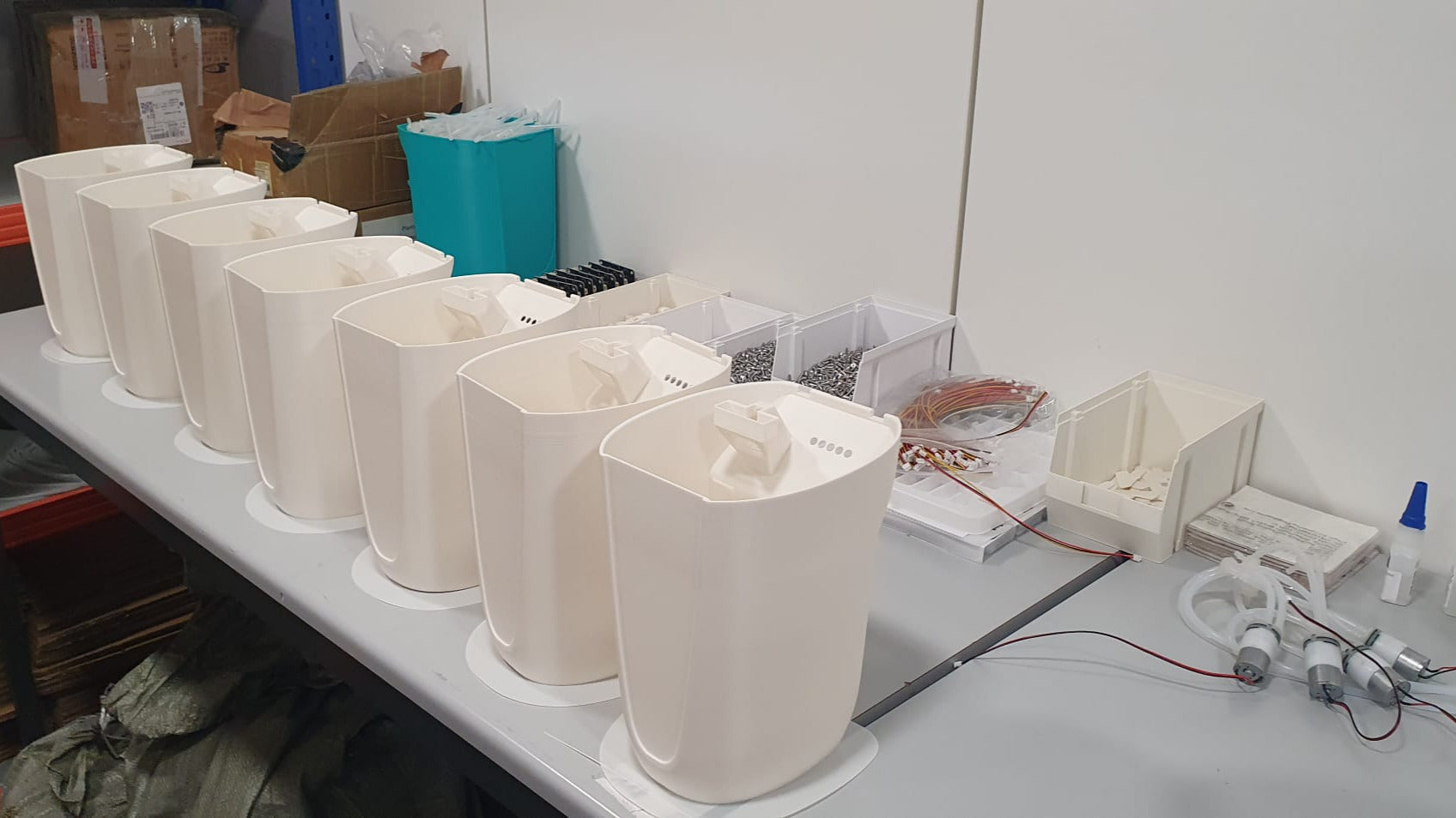 PlantMate smart planter assembly line showing production components and parts ready for manufacturing at Plantup facility