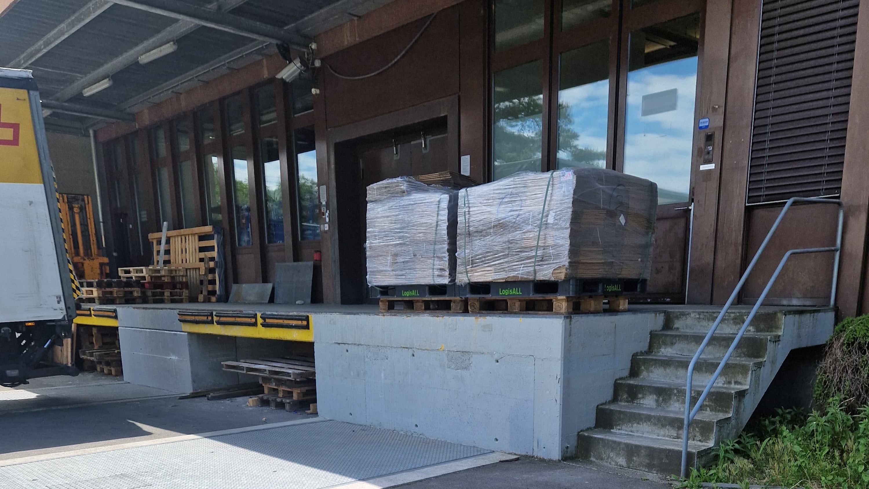 Plantup receiving dock with palletized PlantMate manufacturing parts and components delivered from suppliers for production assembly