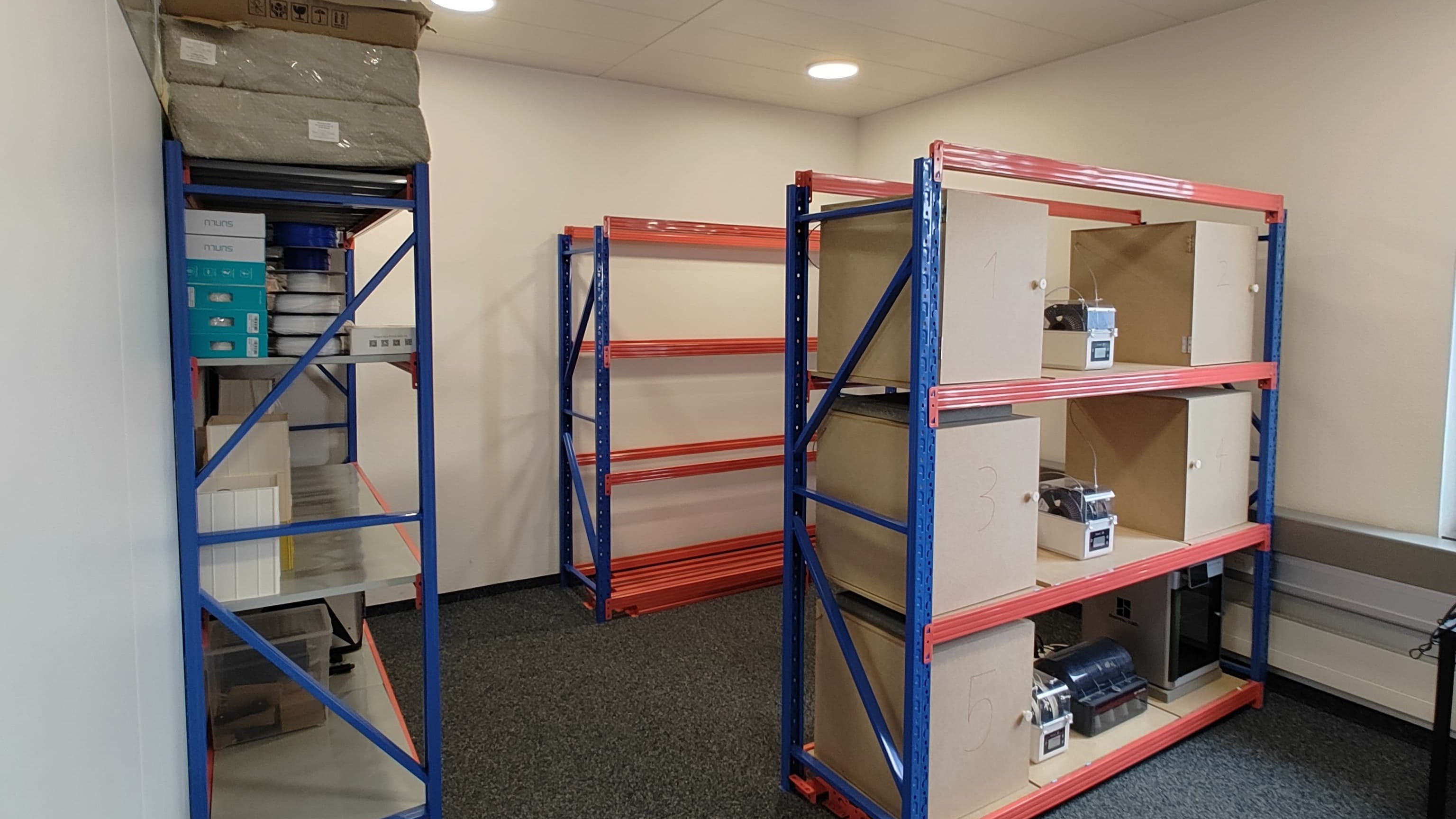 PlantMate storage and inventory area in Swiss facility for automatic plant watering system production